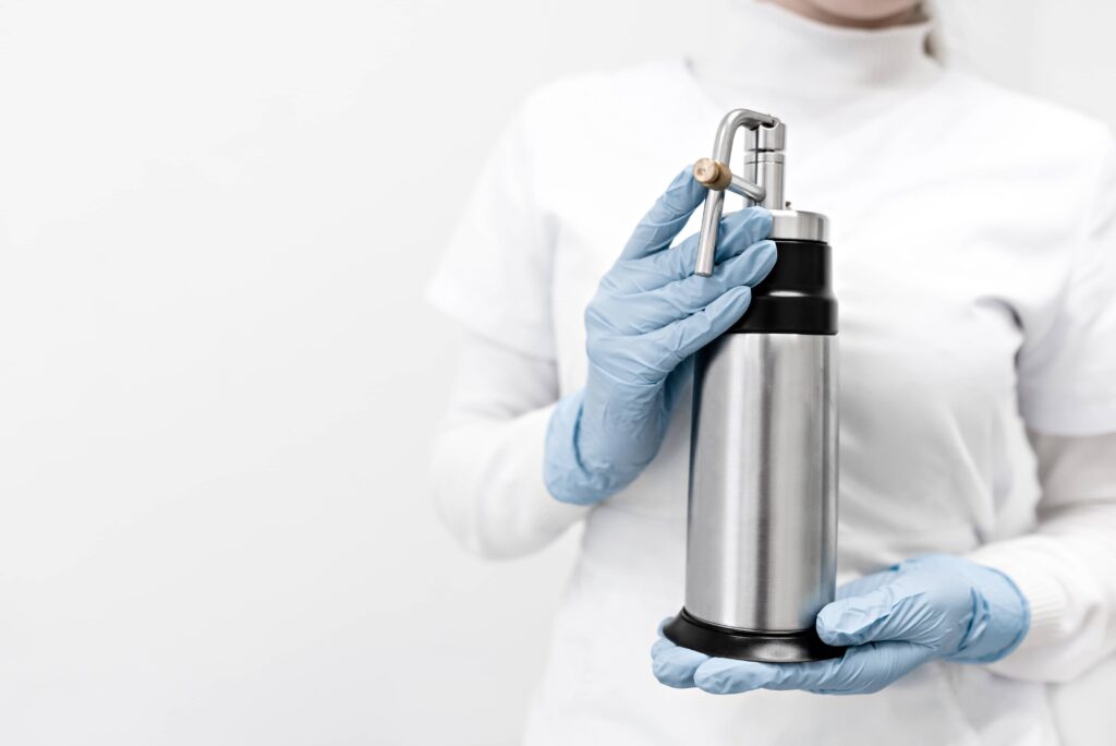 doctor holding cryosurgery device