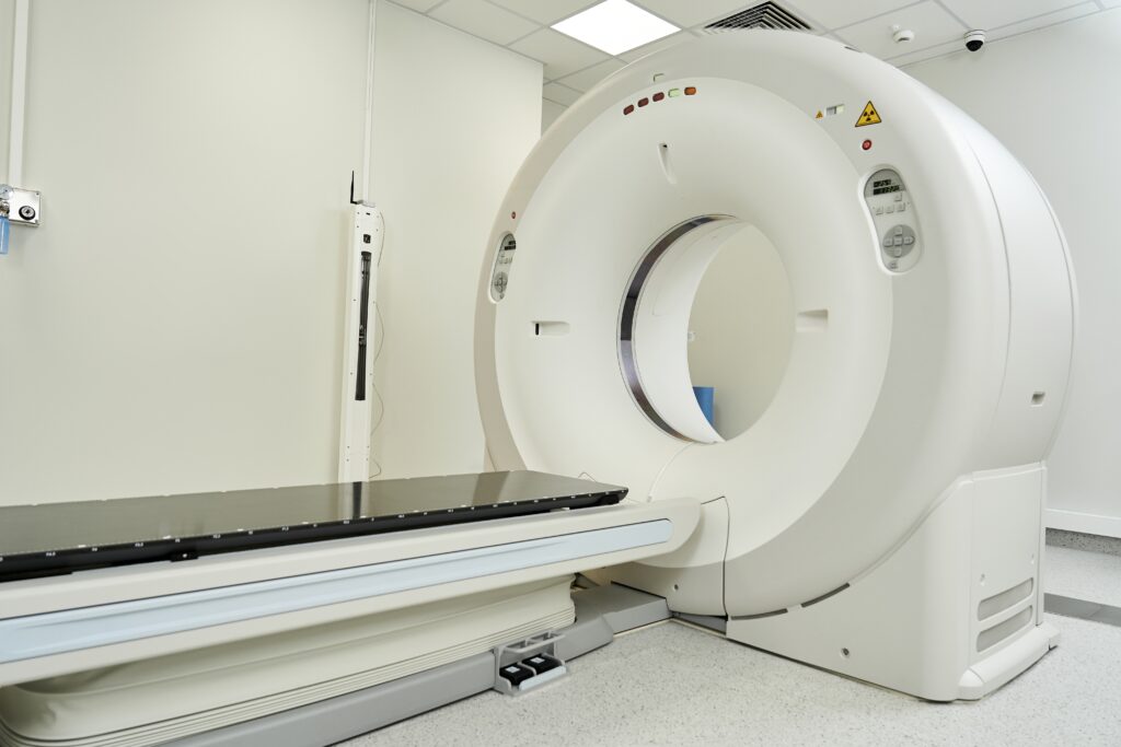 MRI machine inside a medical imaging room prepared for diagnostic patient scans